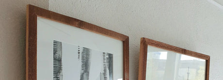 Lijsten en schilderijen strak aan je muur