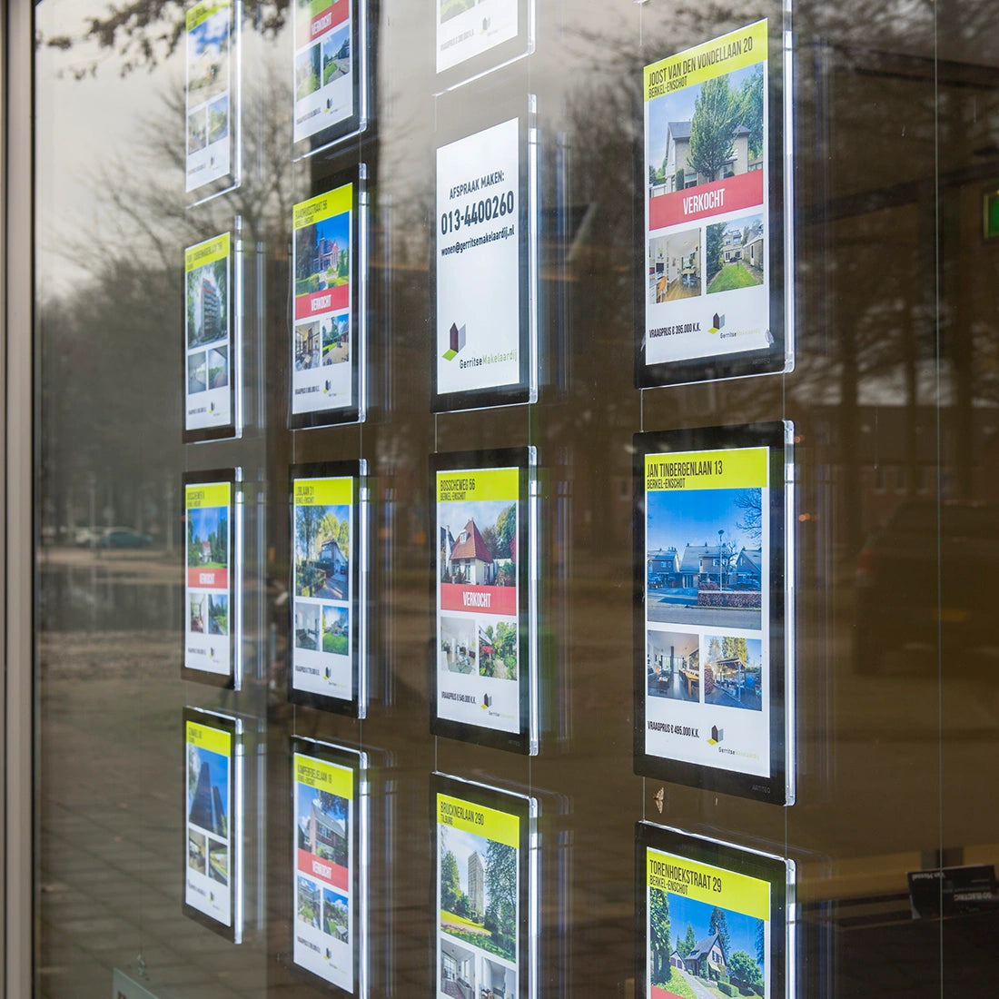 Raam presentatie LED verlichting huizen te koop