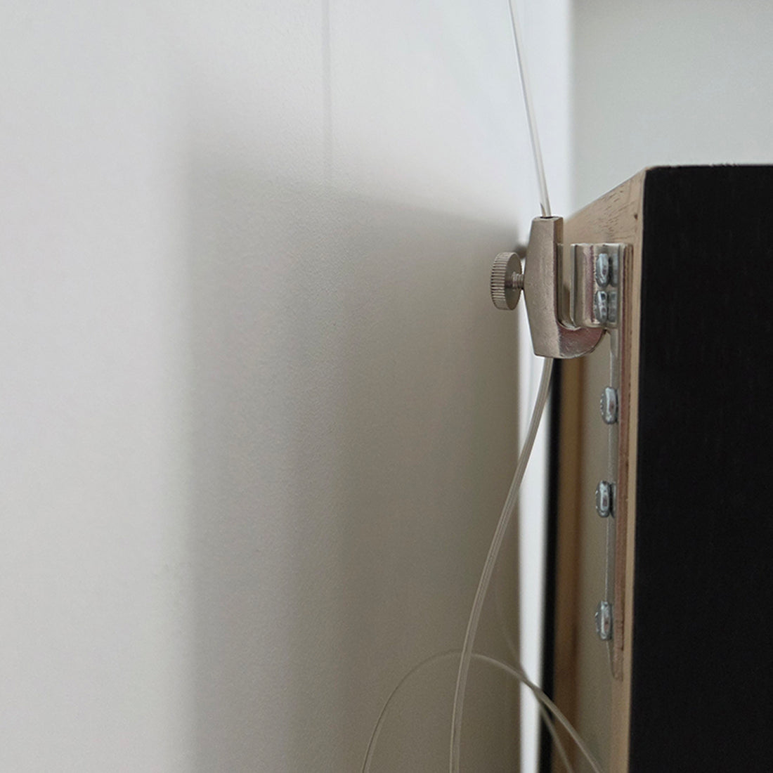 Haak 7 kg achter lijst