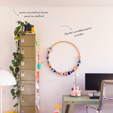 Ronde wanddecoratie aan Up Rail 