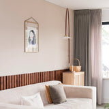 Artiteq Ophanghaak Mini Haak aan lisjt boven bank