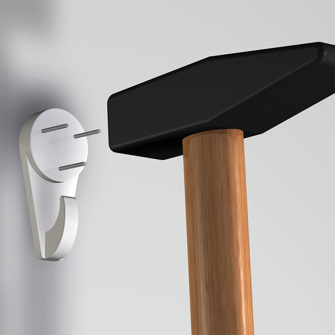 Artiteq betonhaak met hamer in muur